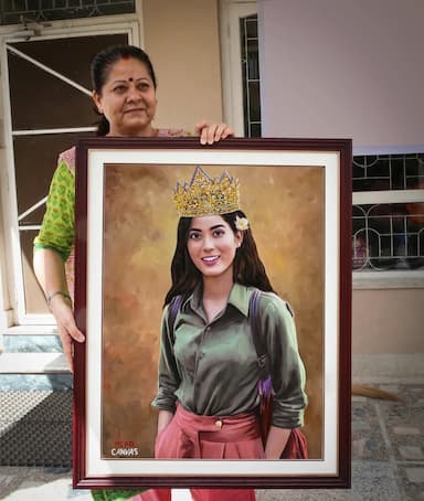 Shrinkhala Khatiwada holding portrait
